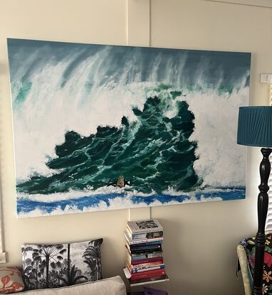 Painting of a girl paddlingf out up a huge rogue wave