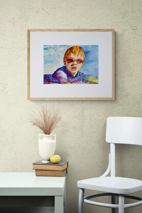 artwork which is the image of a boy swimming wearing goggles 
