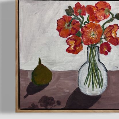 Poppies in the vase with pear on table