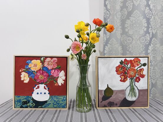 Poppies in the vase with pear on table