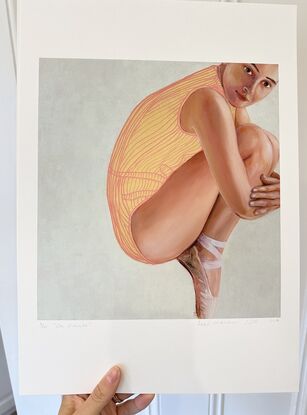 This reproduction of a painting showing a ballerina on pointe shoes. 