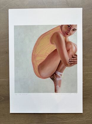 This reproduction of a painting showing a ballerina on pointe shoes. 