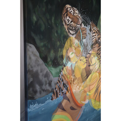 Two tigers playing in water. There is a backdrop of forest greenery. An abstract version of the tigers made of colourful shapes  is painted over the top of the scene. 