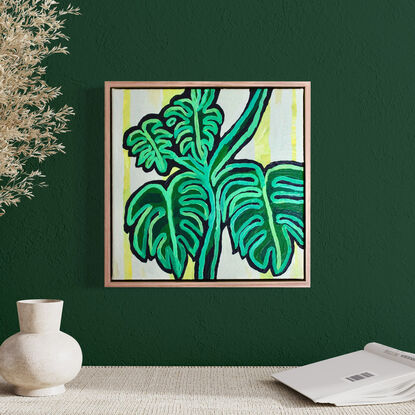 Abstract painting of monstera plant in green with yellow background.