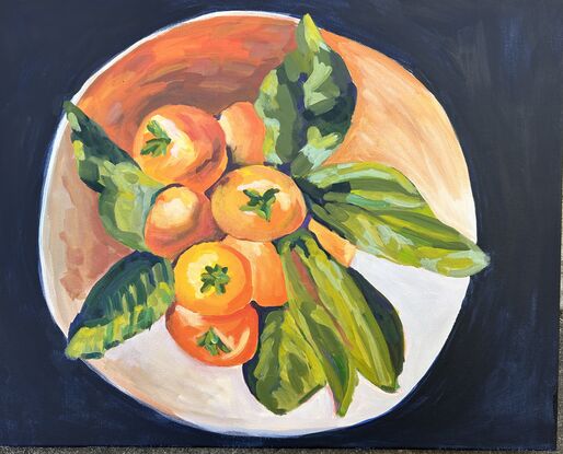 Ariel view of bright oranges in a large bowl