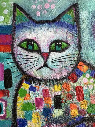 Quirky, colourful , seated cat .