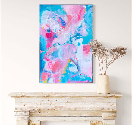 Shades of pink, coral and blues play on the canvas.  A textured, layered artwork.