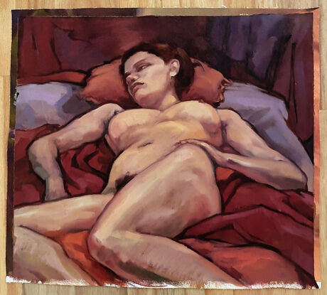 Oil painting on canvas of a reclining female nude, painted from life. She is relaxing on maroon and mauve colored fabrics, with one hand resting on her hip. It is a foreshortened view from the knees up to the head. Her head is resting on a red colored cushion. It is finished off with a gloss varnish.