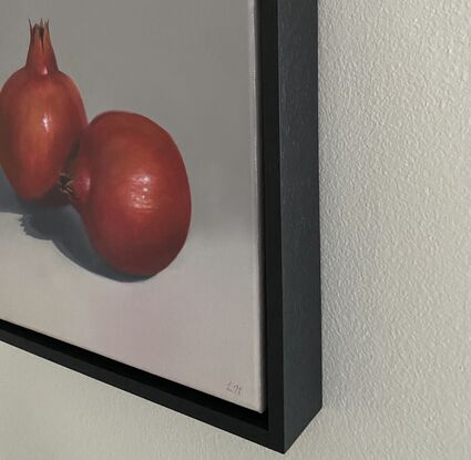 This painting celebrates the simplicity of the pomegranate and the beauty of this red fruit. Framed in a bespoke black timber frame. 