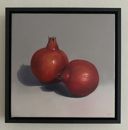 This painting celebrates the simplicity of the pomegranate and the beauty of this red fruit. Framed in a bespoke black timber frame. 