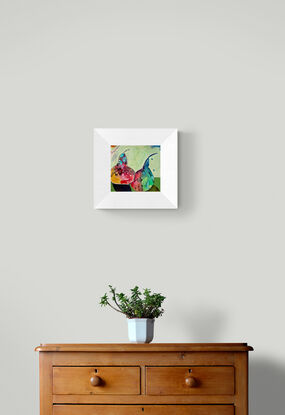 A pair of rainbow coloured abstract pears with mint background