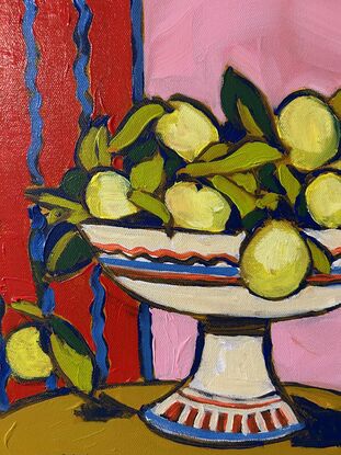 a modernist still life with bright red and pink background. A white pedestal bowl of lemons sits on a rounded brown table