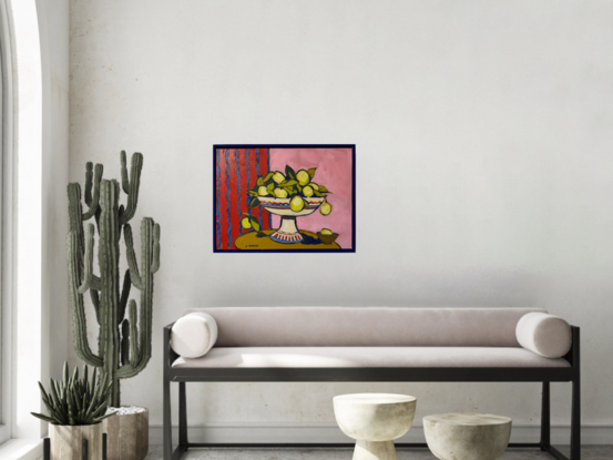 a modernist still life with bright red and pink background. A white pedestal bowl of lemons sits on a rounded brown table