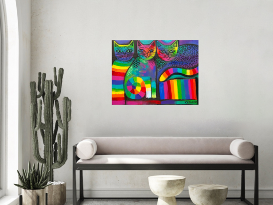 Three abstract, rainbow coloured cats.