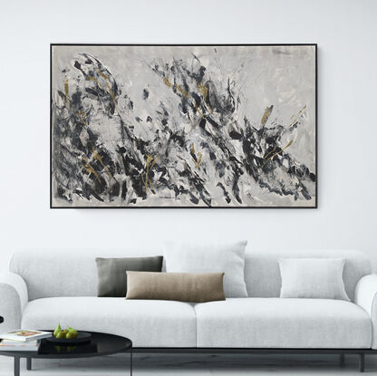 a large abstract landscape in shades of black, grey and white inspired by trees, branches and light. there is metallic gold leaf.