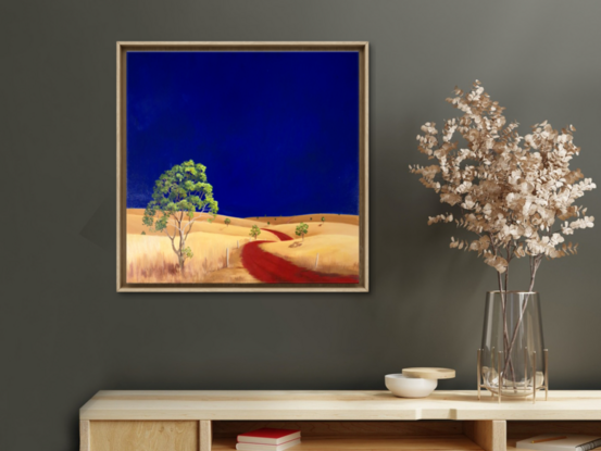 Australian landscape with dark blue sky and gold and yellow highlighted hills and foreground, an orange red road leads out of the painting with trees scatterd throughout,  Lucinda Leveille, original artwork