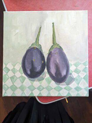 Eggplants on green and white check