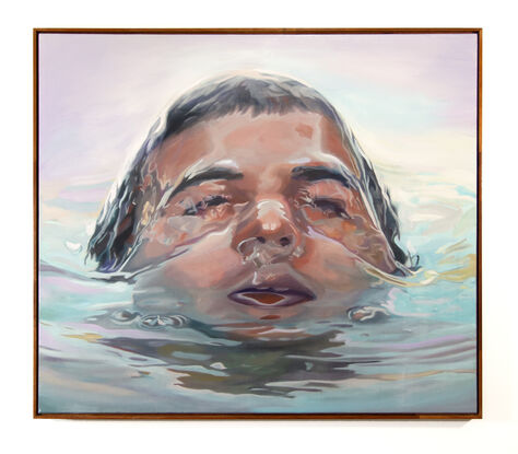 
This artwork by Tom Gibbs features a close-up portrait of a person partially submerged in water. The face, seen at eye level with the water, is serene and peaceful, with closed eyes and relaxed features. The water around the face ripples gently, distorting and reflecting light in a way that creates a mesmerizing interplay of colors and shapes. The artist uses a soft palette of pastels, with shades of pink, blue, and lavender, giving the painting a calming, dreamlike quality. The surface of the water and the subtle reflections on the skin are rendered with meticulous detail, emphasizing the tranquil and immersive nature of the scene. This painting evokes themes of tranquility, introspection, and the soothing embrace of water.