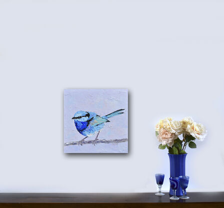 Textured oil painting of a native Australian bird, the Splendid Fairy Wren, perched on a twig. The bird has a light blue head with a black stripe and a light and dark blue feathered chest. The background is sky blue.