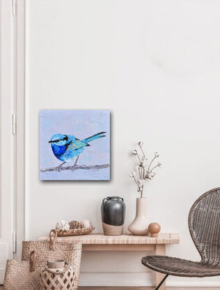 Textured oil painting of a native Australian bird, the Splendid Fairy Wren, perched on a twig. The bird has a light blue head with a black stripe and a light and dark blue feathered chest. The background is sky blue.