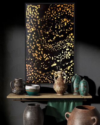 A black canvass with clusters of shimmering gold stars in an abstract impressionist style