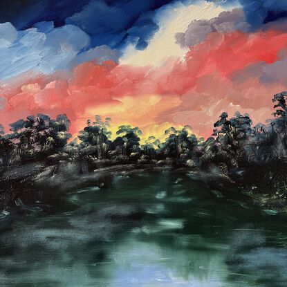 Clouds reflecting in water with silhouette trees and sun down. Deep blue and greens with red, yellow and light blue.