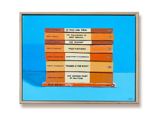 A pile of orange toned books on a blue background.