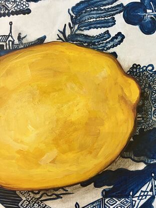 Yellow lemon on Willow plate  with green background