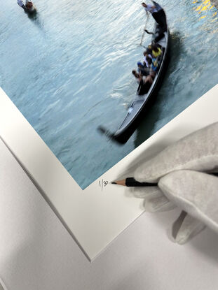 Gondoliers on Grand Canal in Venice, Italy