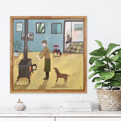 The painting depicts a woman standing in a room. There is a wood fire and she is reaching her hands out towards her. There is a dog behind her. There are paintings on the wall in the background and a red chair. 