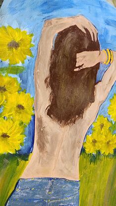 Sunflower field, woman standing, being free