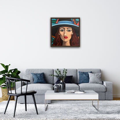 Mid century modern colours and style with a beautiful woman’s face wearing a large hat, geometrical designs and modern feel