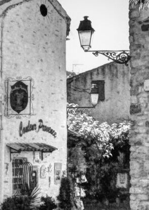 Old alley in country town in lavender area of Provence, France