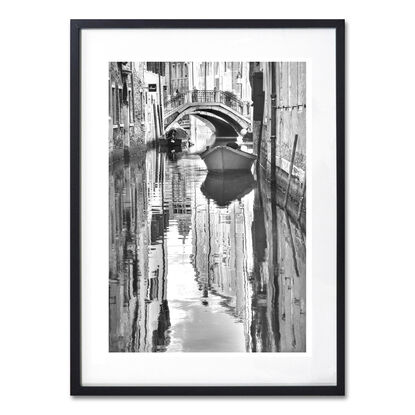 Inviting reflection on canal in Venice, Italy