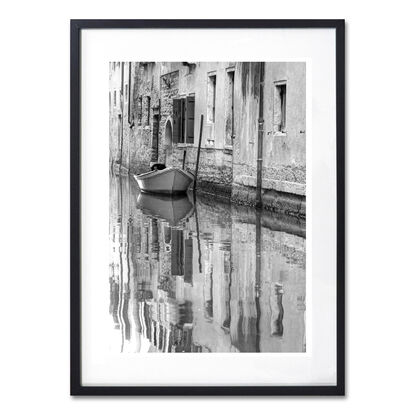 Inviting reflection on canal in Venice, Italy