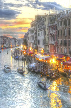 Inviting reflection on canal in Venice, Italy