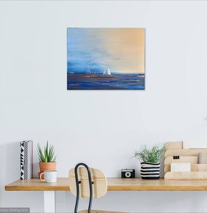 Two sailing boats returning to shore in fading light