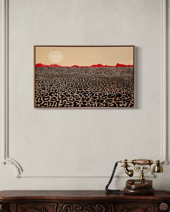 A desert lanscape, leopard print foreground mimics the dry cracked desert eath, and the mountains are a lipstick red against a cream-coloured sky.