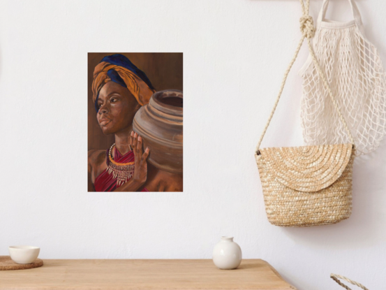 Portrait of an African woman holding a pot