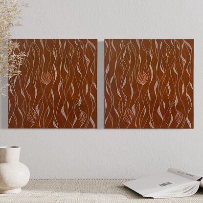 Loose patterns of white and bronze set against a background of earthy orange/red.