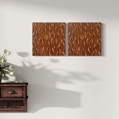 Loose patterns of white and bronze set against a background of earthy orange/red.