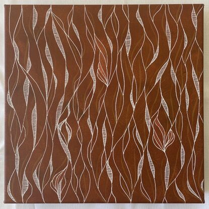 Loose patterns of white and bronze set against a background of earthy orange/red.