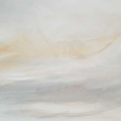 An abstract of clouds and landscape in earth colours of brown, cream, beige and cream