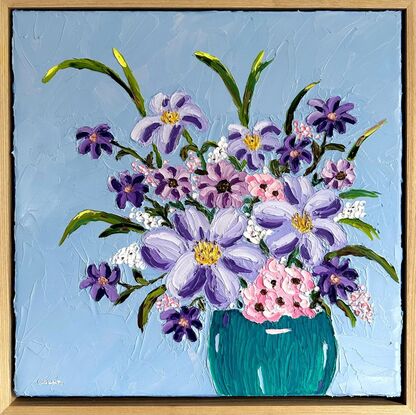 An oil painting of a turquoise vase holding soft soft pink and purple flowers.