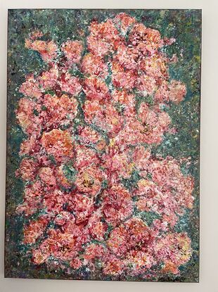 .
Textured Pink flowers, rhododendrons, cover the canvas, on a background of green/ blue. Drops of rain in pale  blue appear on the flowers, along with gold highlights showing glistening flowers in sunlight after rain.
