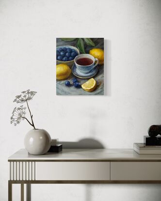 Still life with  lemons, blueberry ,  a cup of tea/coffee 