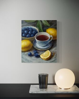 Still life with  lemons, blueberry ,  a cup of tea/coffee 