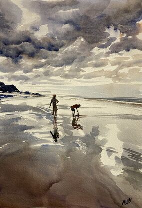 A cloudy day casts reflections on wet sand on Wye River beach