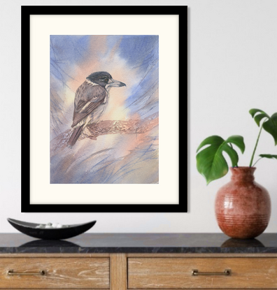 Grey Butcherbird perched on a textured branch with an abstract background