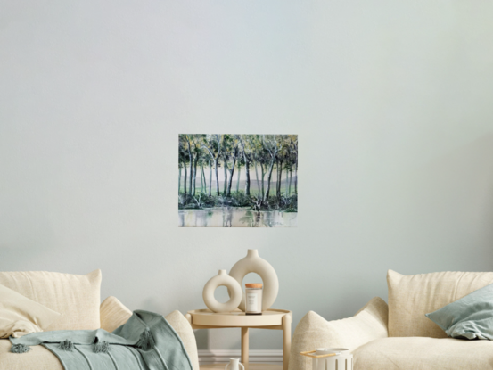 Trees & water with a green tone overall. Framed in white timber.  No glass needed